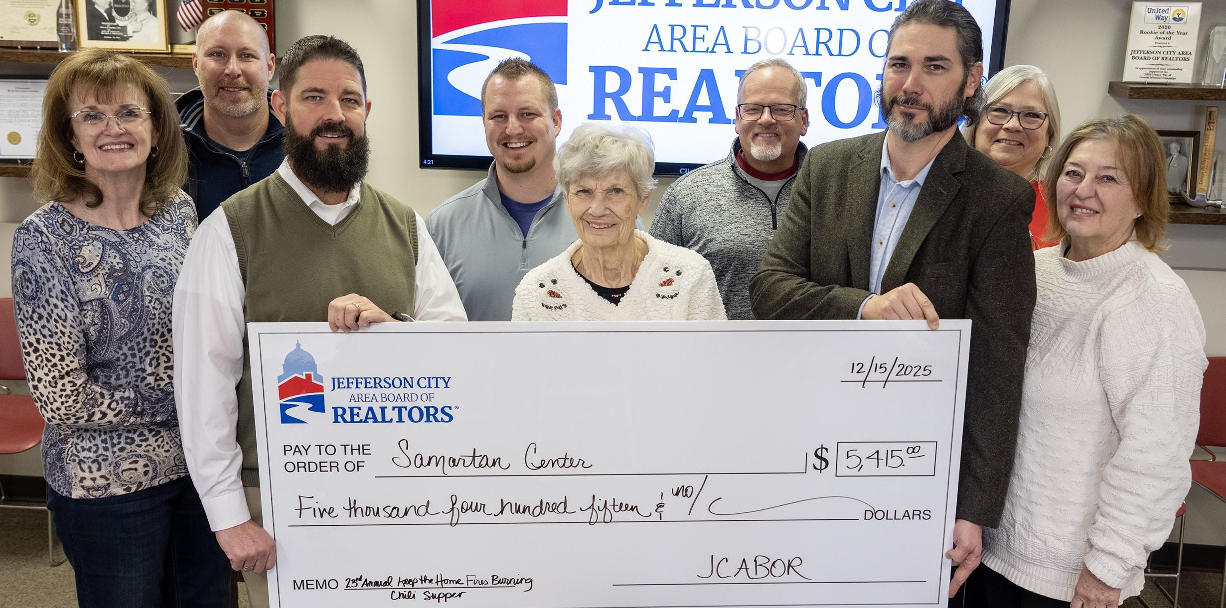 Check Presentation to Samaritan Center; Proceeds from the REALTORS & Friends Keep the Home Fires Burning